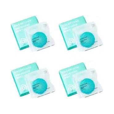 A set of four boxes of dental floss.