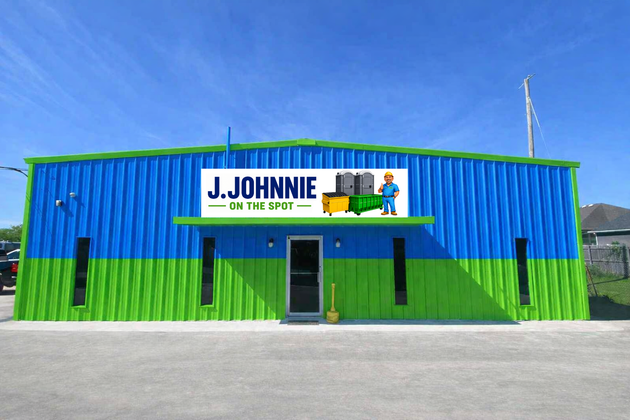 Blue and green J. Johnnie storefront under a clear sky with a central door and sign above the entrance