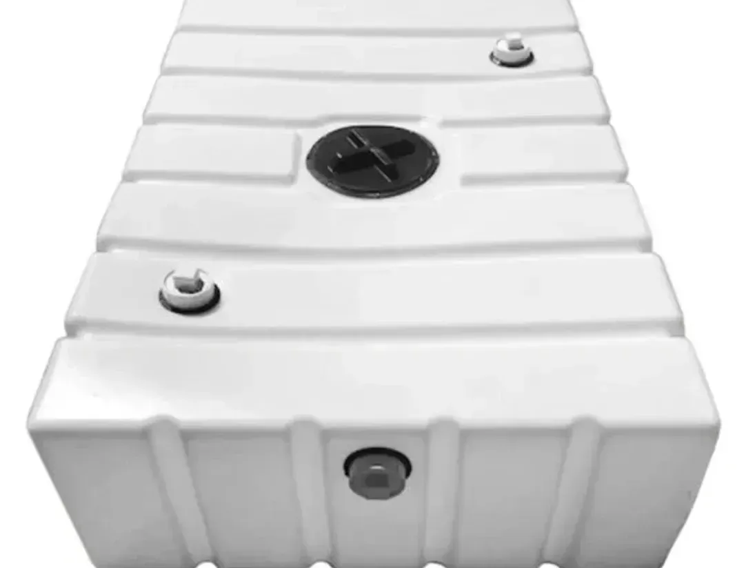 White rectangular utility tank with black cap and small metal fittings, viewed from above