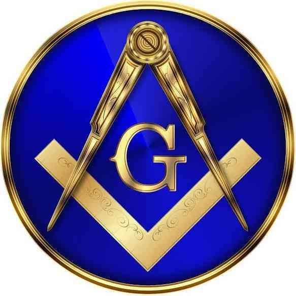 A gold Masonic square and compasses with the letter 