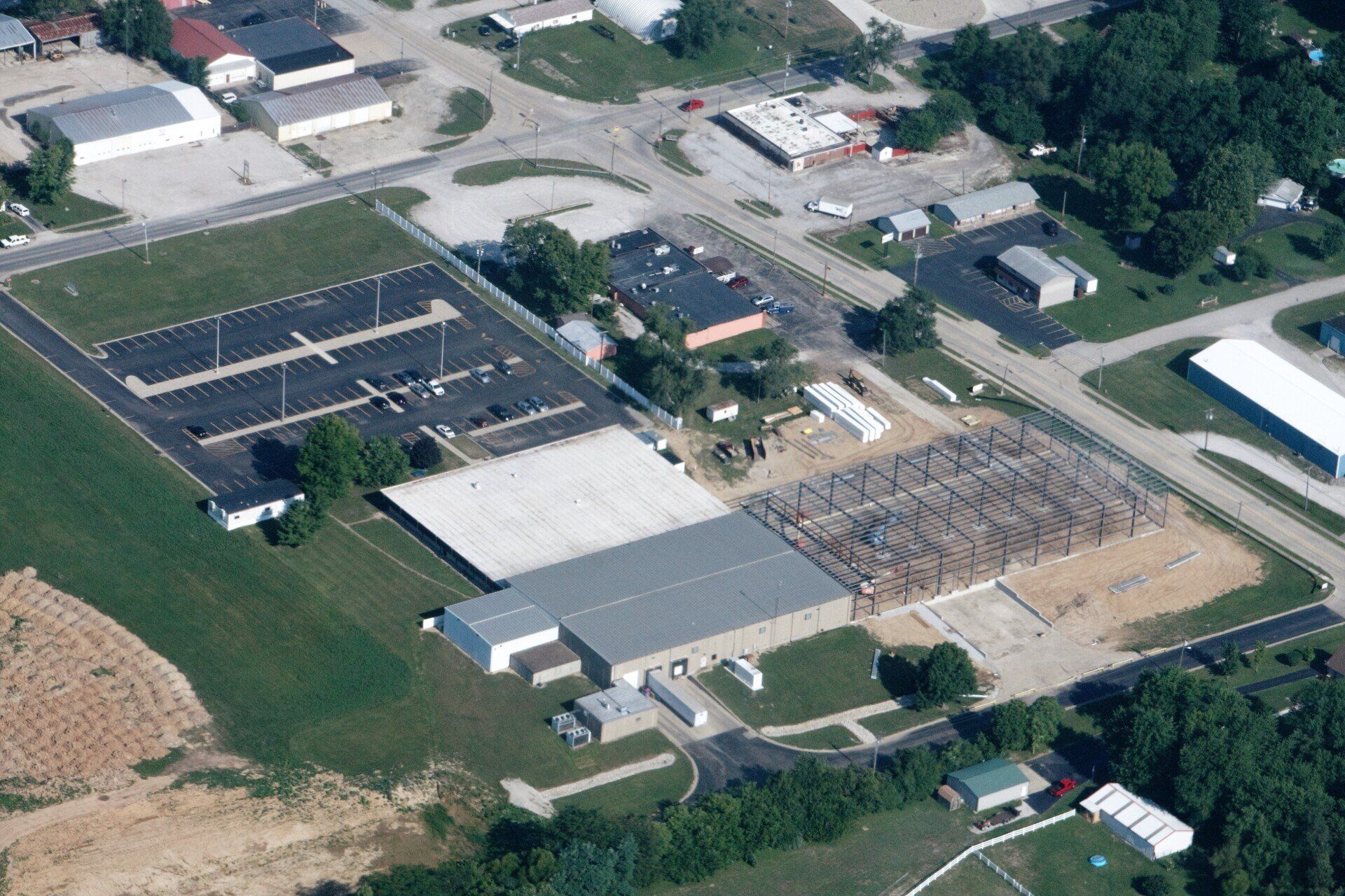 An aerial view of a small town with lots of buildings