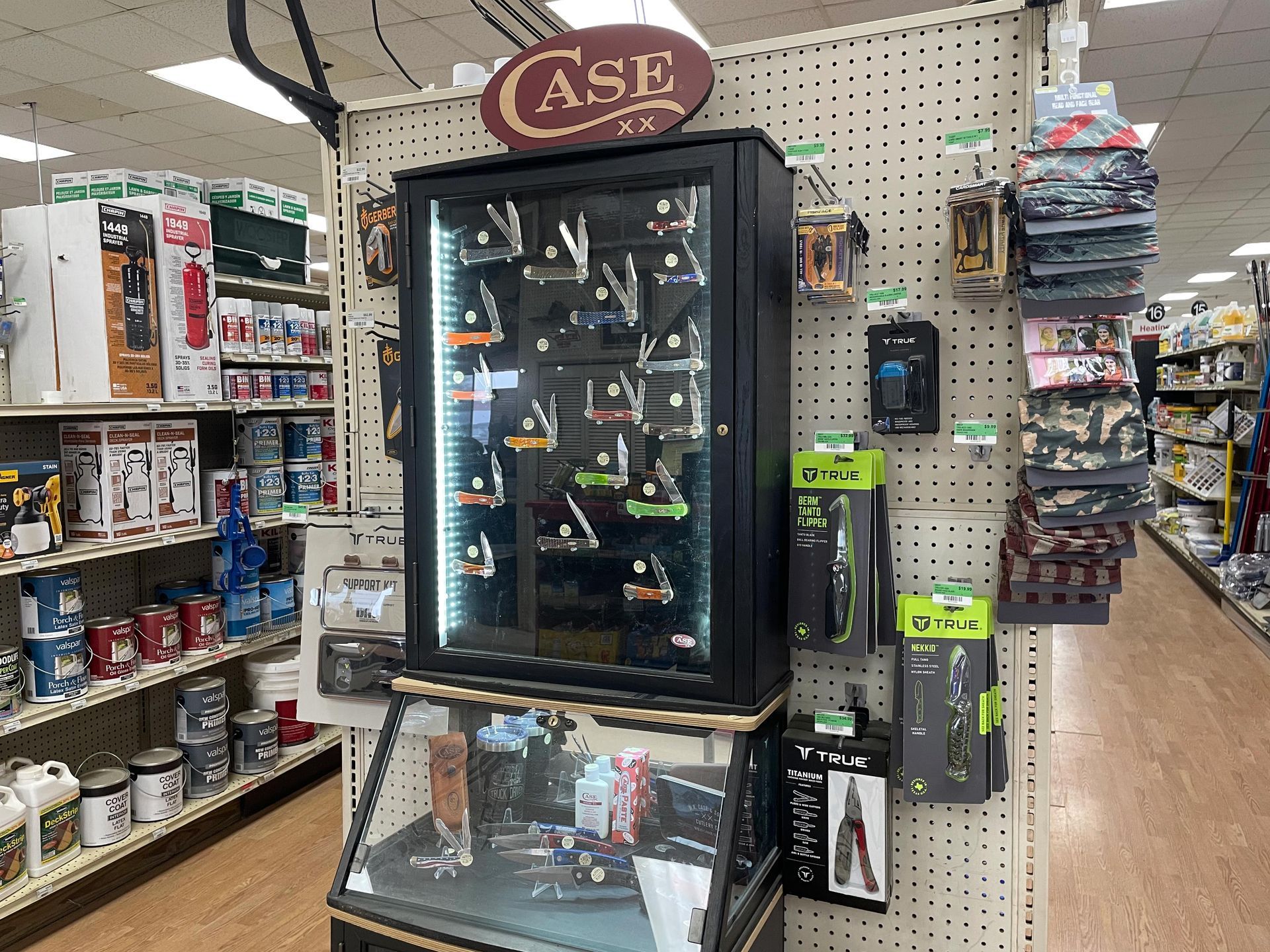 A case of tools is displayed in a store.