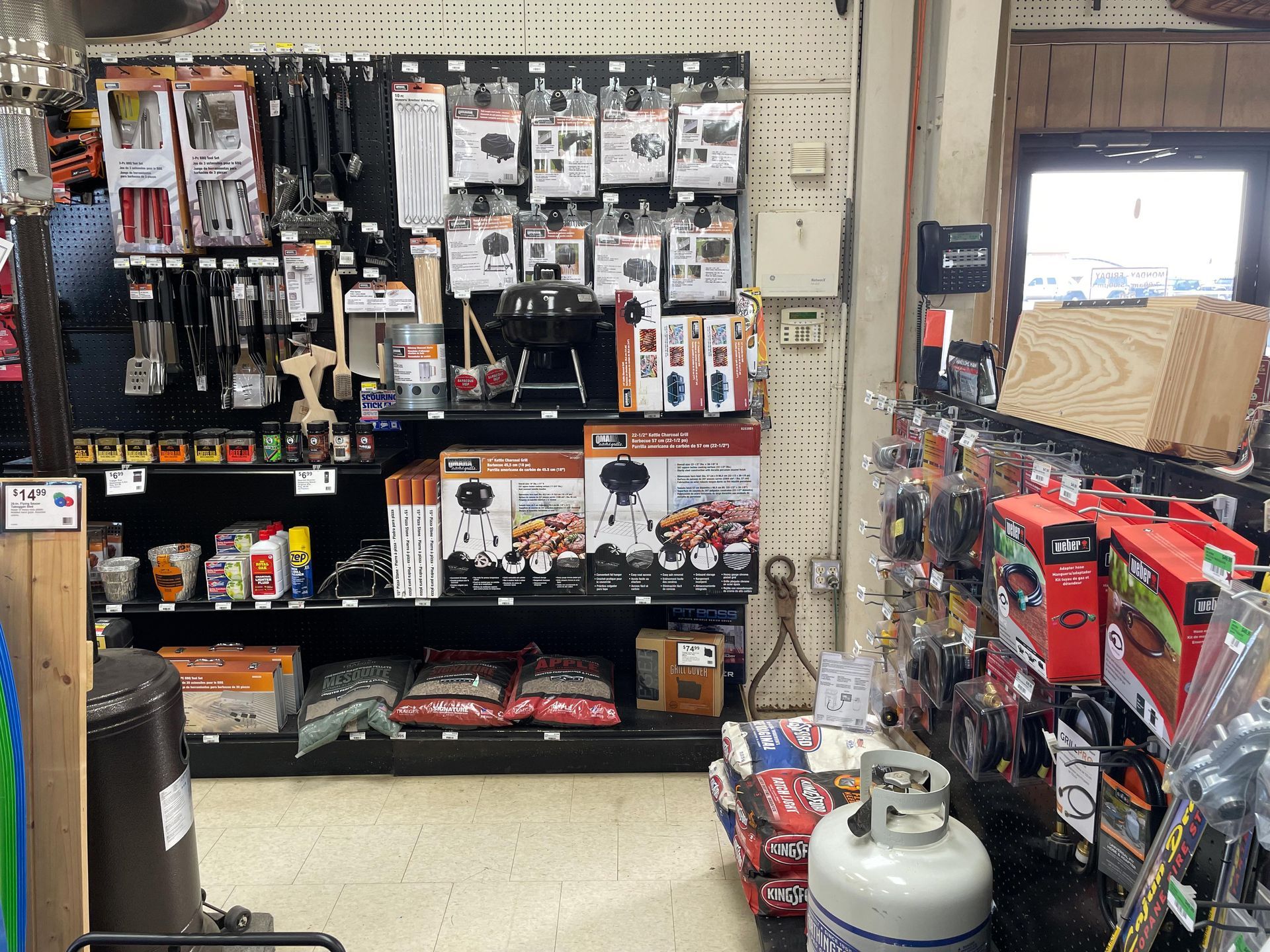 A store filled with lots of items including a propane tank
