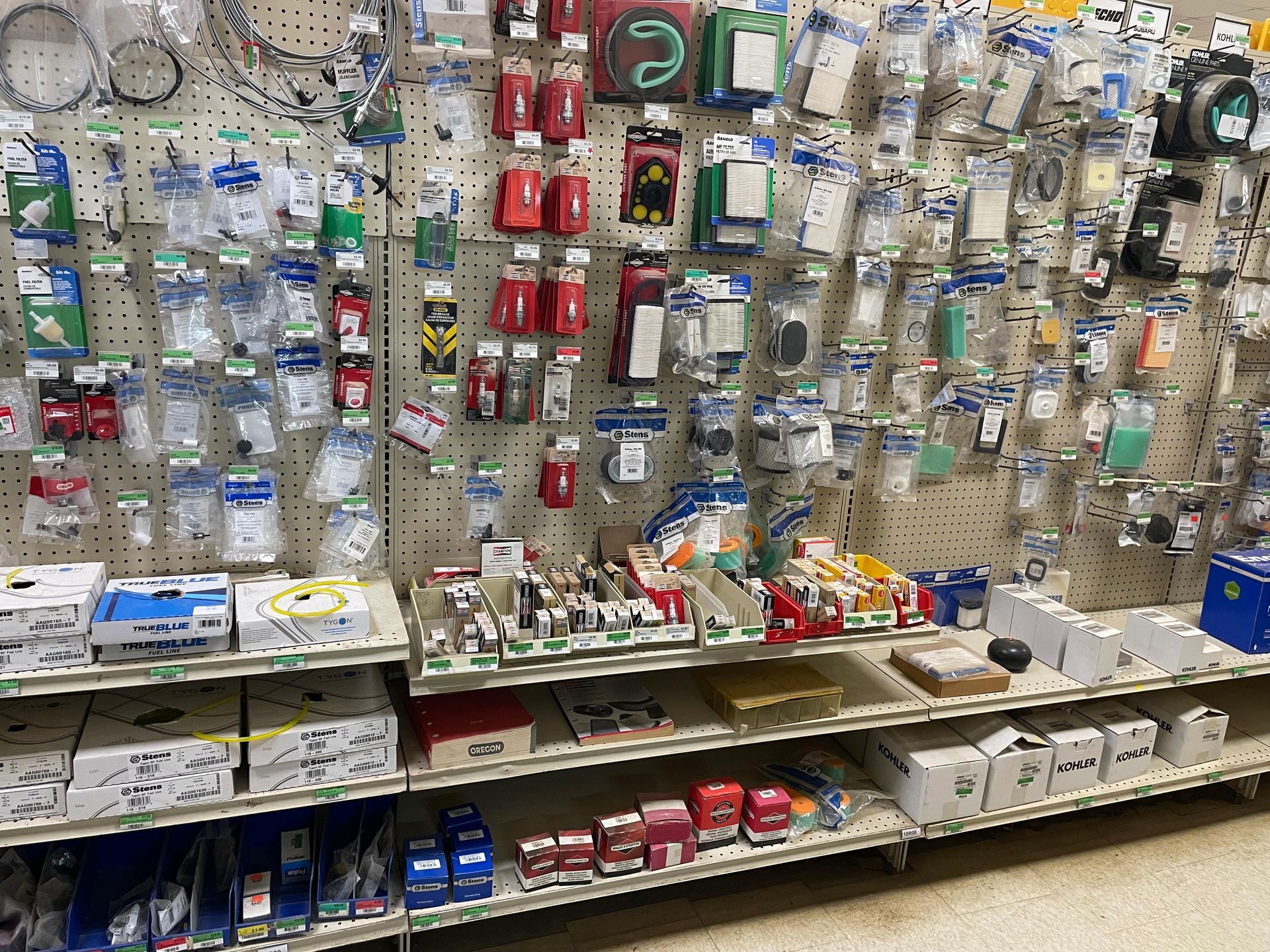 A store aisle filled with lots of electrical supplies.