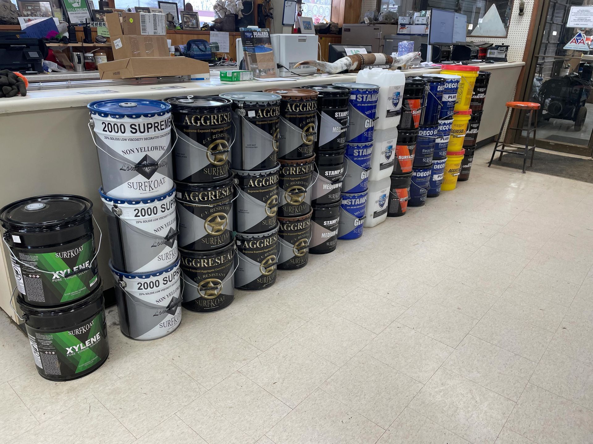 A row of buckets stacked on top of each other in a store.