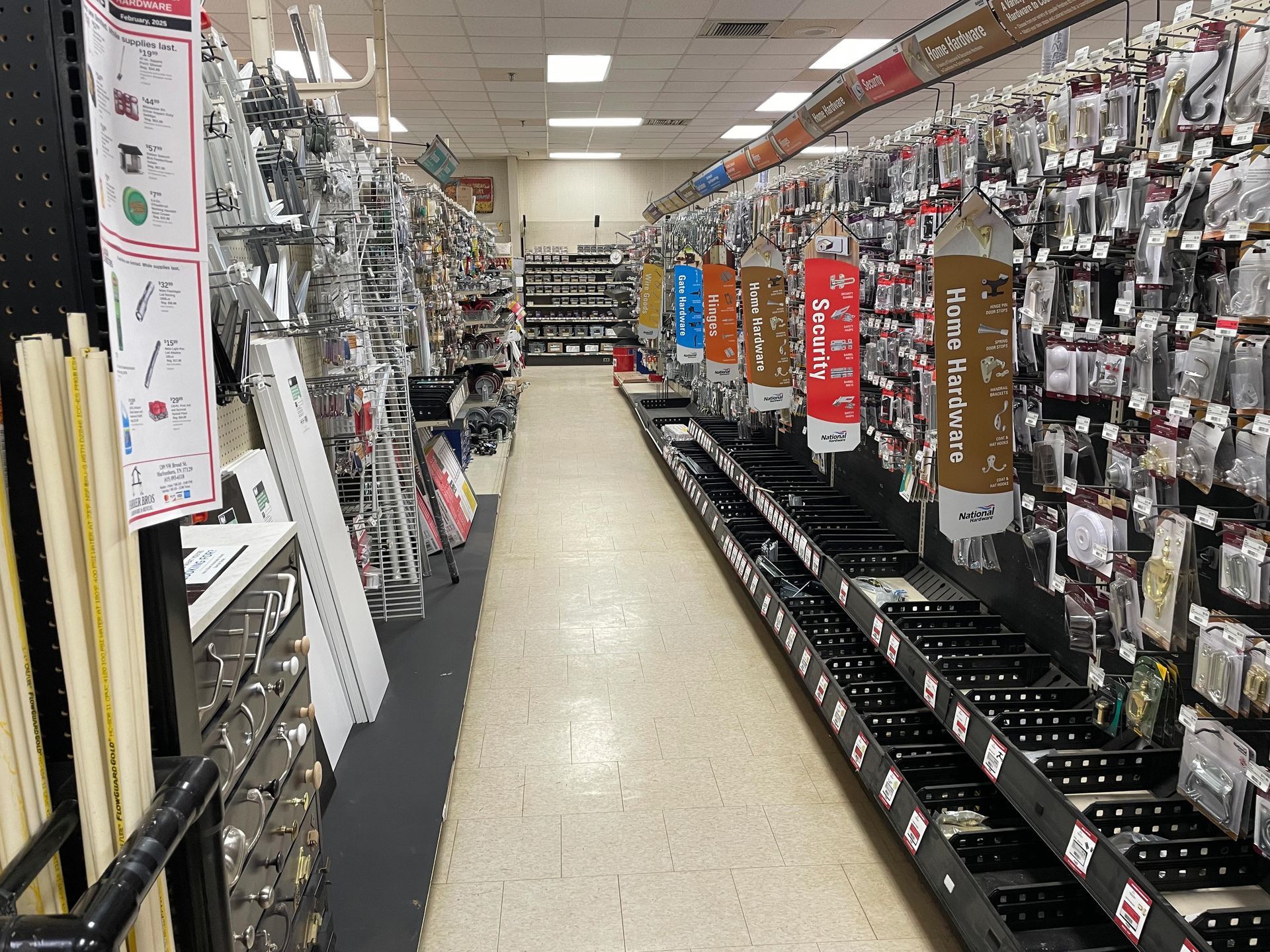 The inside of a hardware store with many shelves