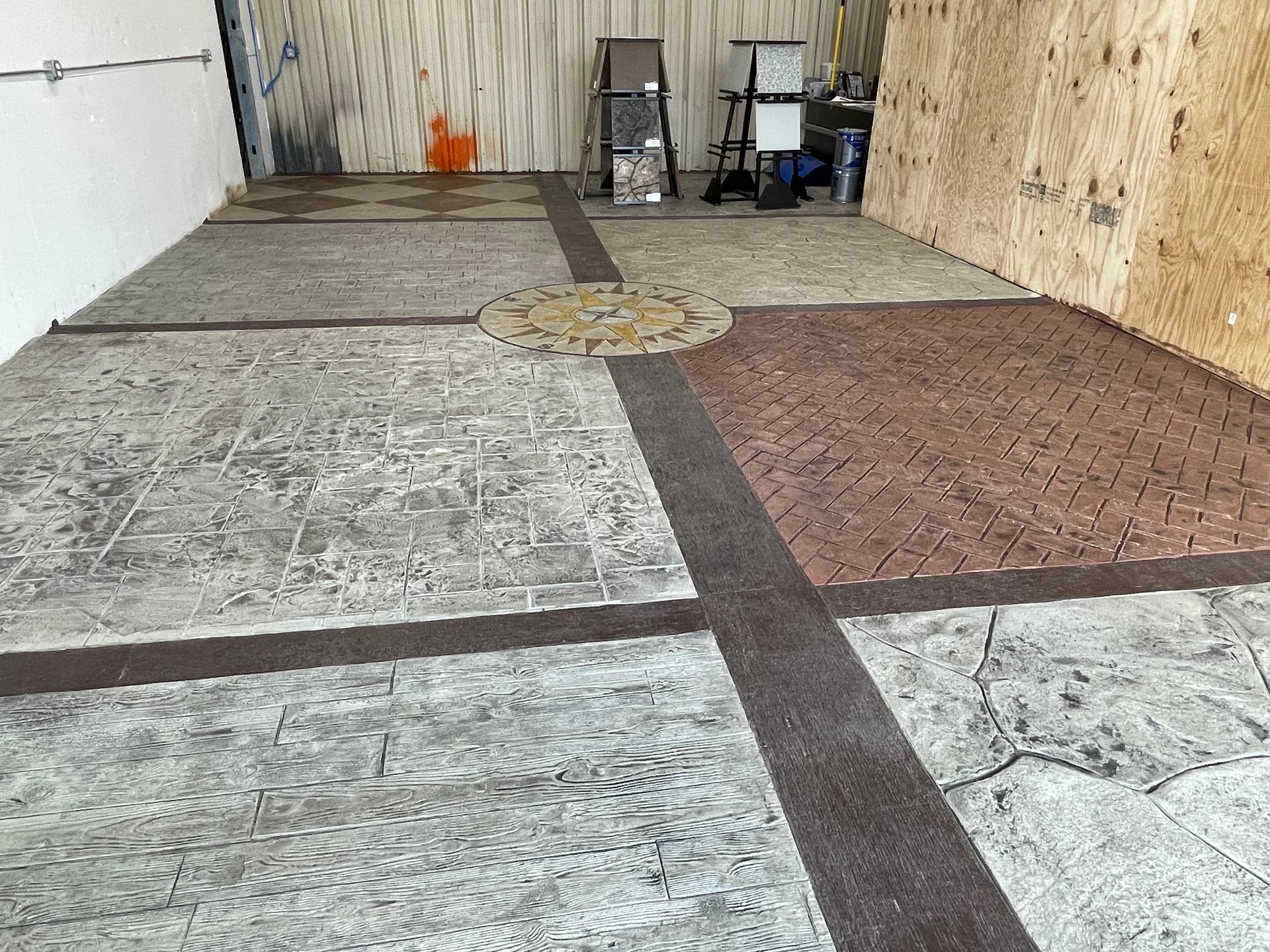 There are many different types of concrete floors in this room.