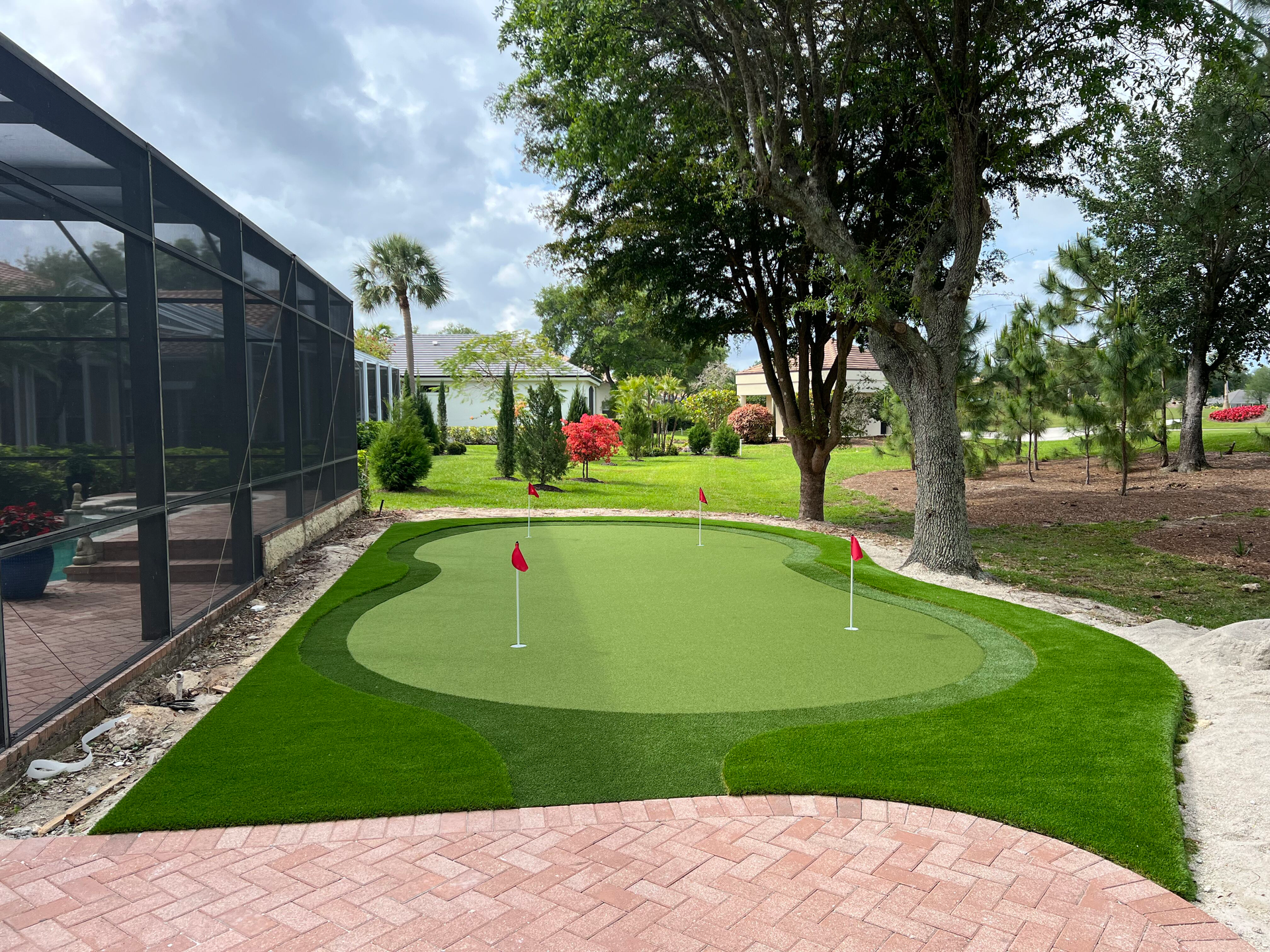 A lawn with an artificial & Synthetic golf putting green in Mendham, NJ 07945