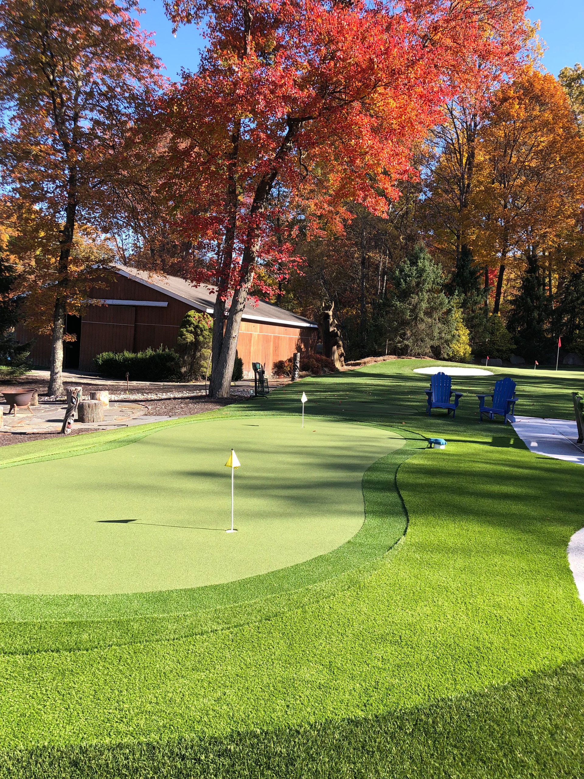 A lawn with an artificial & Synthetic golf putting green in Mendham, NJ 07945