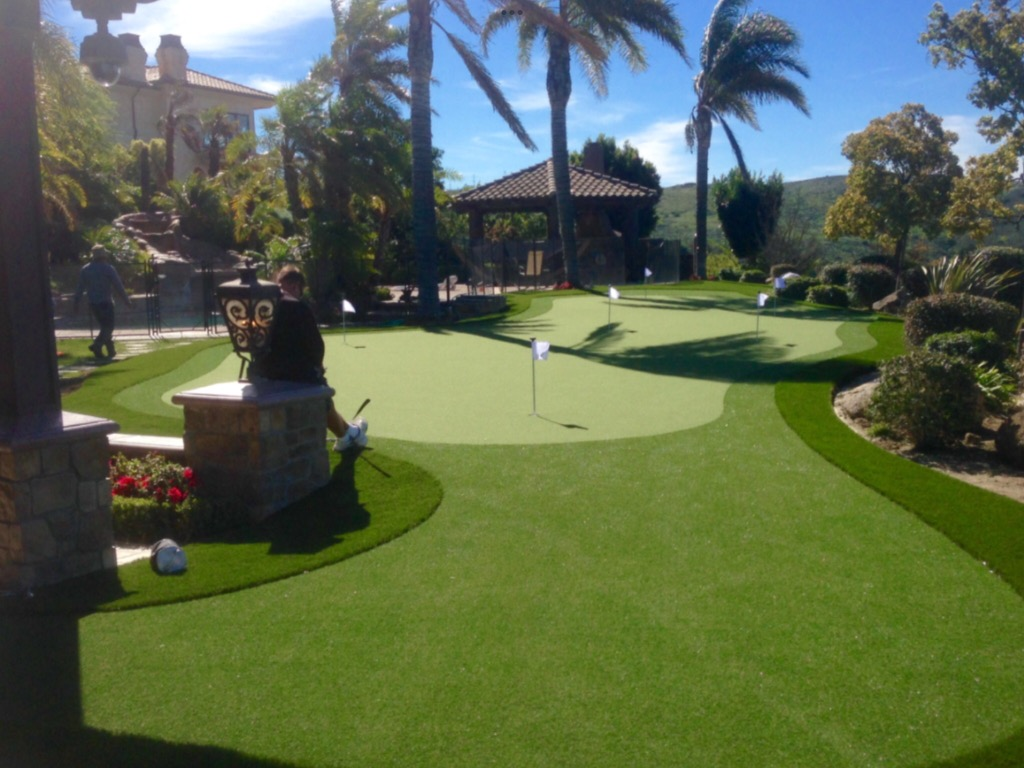 A lawn with an artificial & Synthetic golf putting green in Mendham, NJ 07945