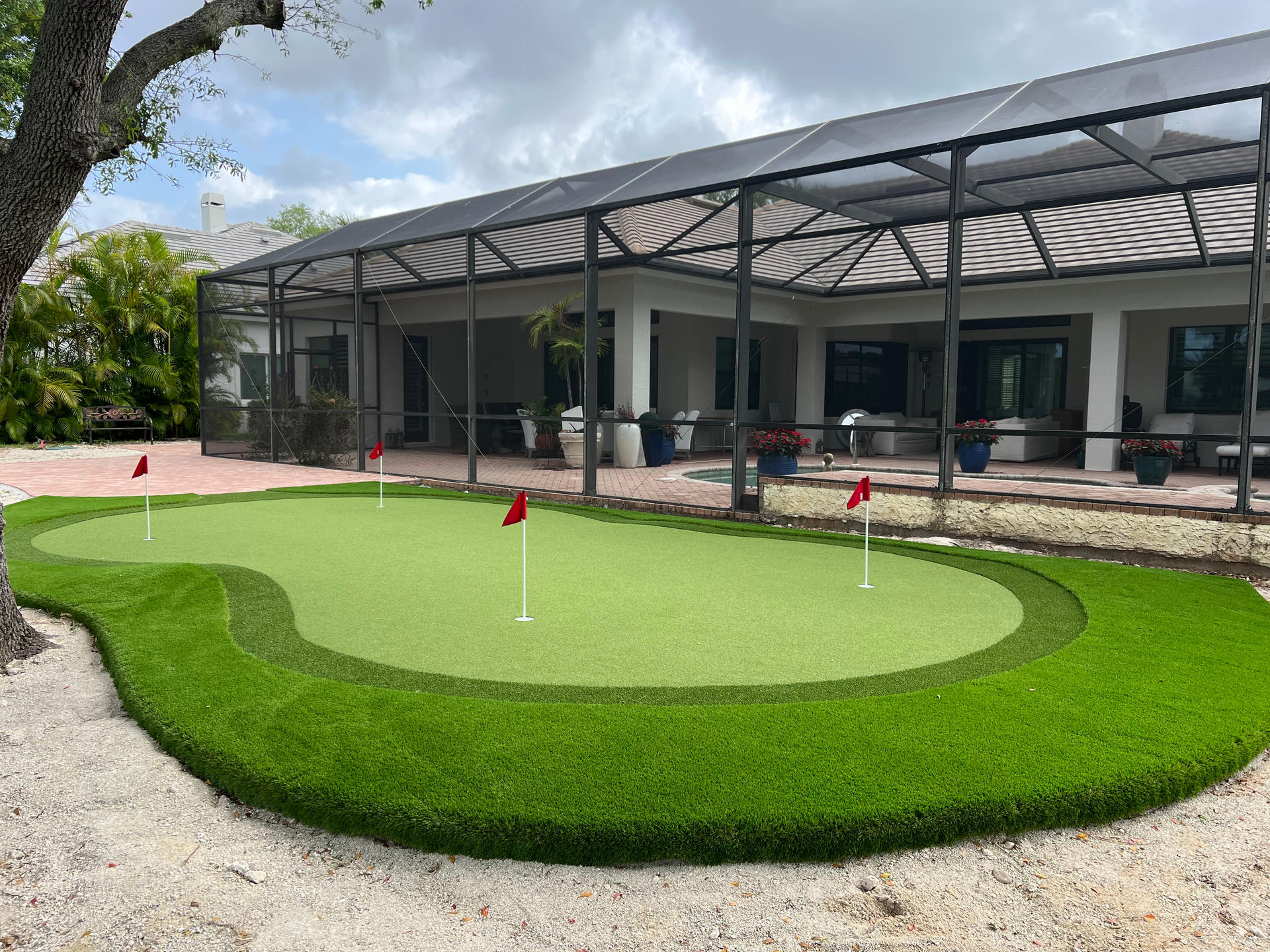 A lawn with an artificial & Synthetic golf putting green in Mendham, NJ 07945