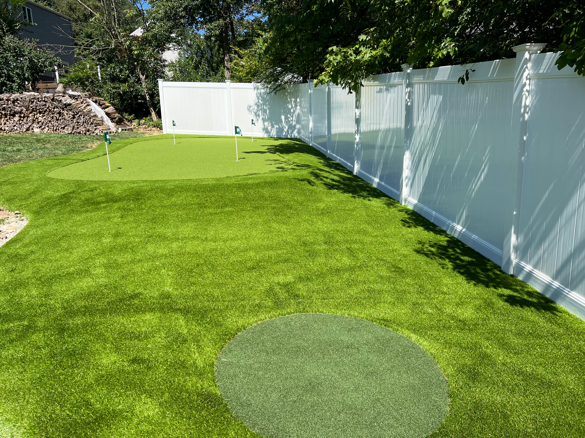 A lawn with an artificial & Synthetic golf putting green in Mendham, NJ 07945