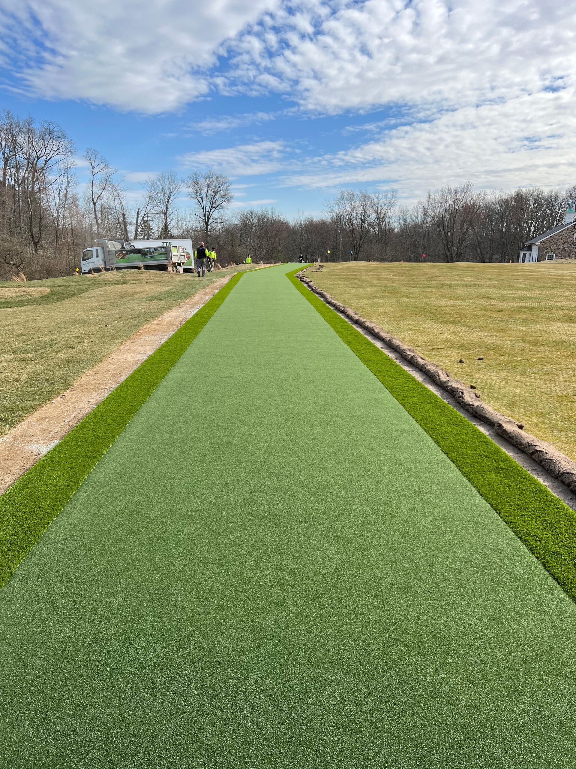 A golf course is being built in the middle of a field.