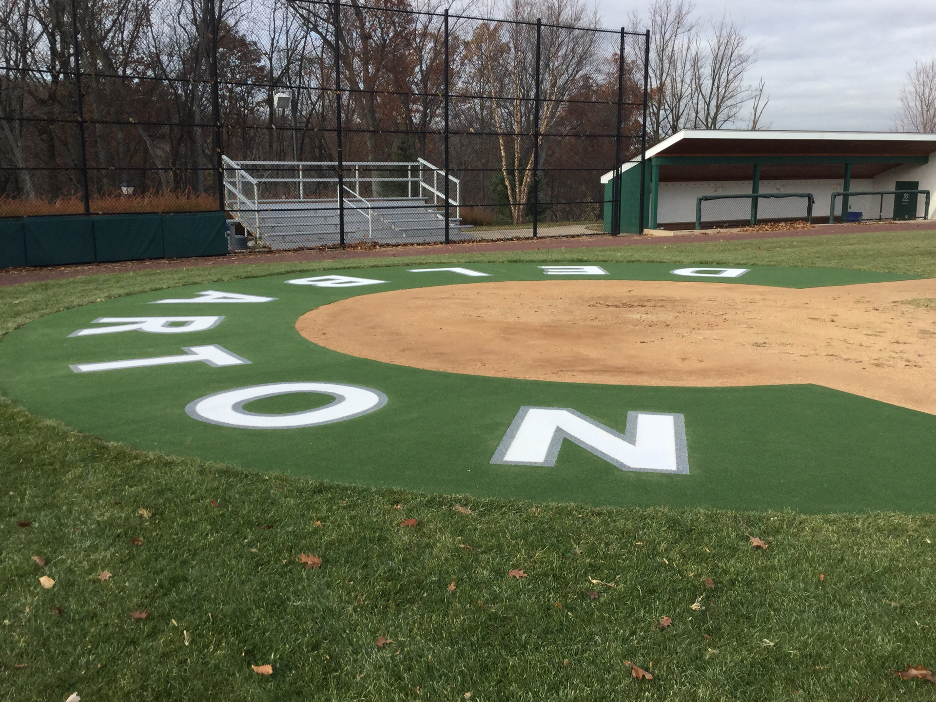 A baseball field with the letters n and o painted on it.