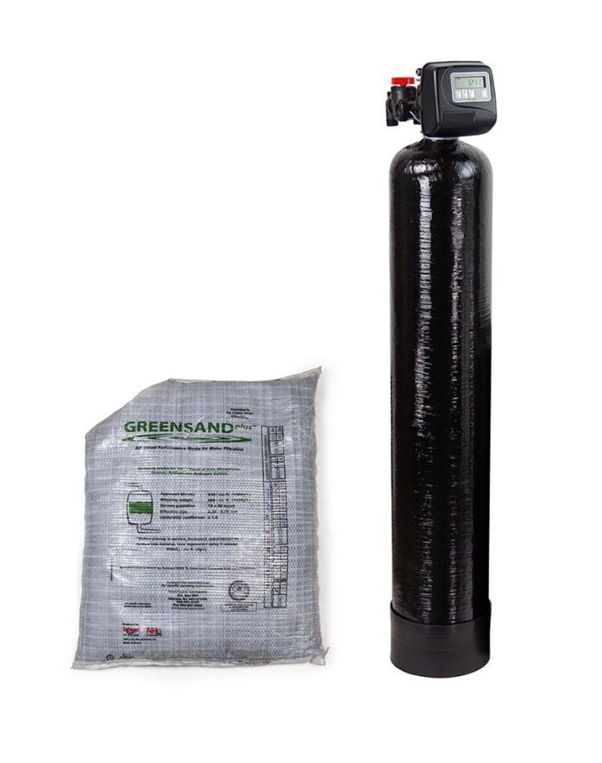 Water softener tank with control valve beside a bag of green sand filter media