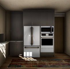A kitchen with a refrigerator, microwave, and oven.