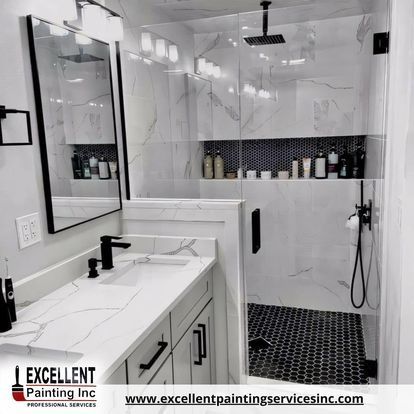 A bathroom with a sink, mirror and shower.