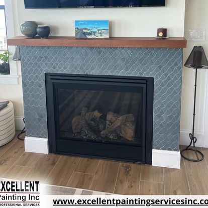 A fireplace in a living room with a tv above it