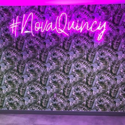 A neon sign that says