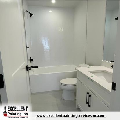 A bathroom with a sink, toilet, bathtub and shower.