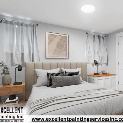 A bedroom with a bed, nightstand, lamp and painting on the wall.