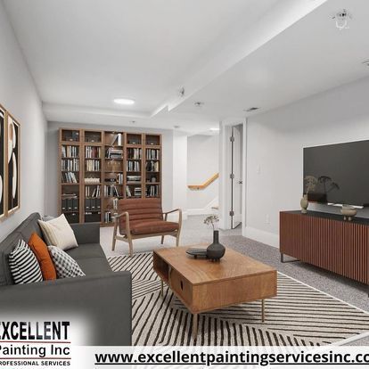 A living room with a couch, chair, coffee table and television.