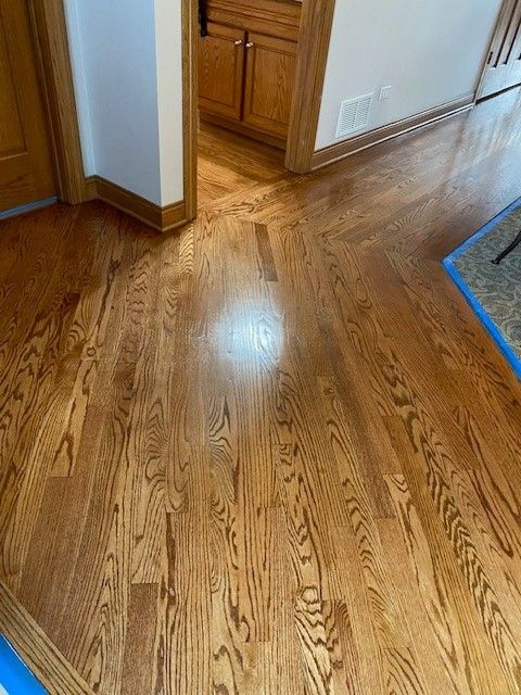 a close-up of a wooden floor in a room