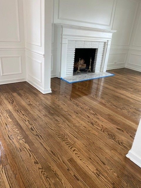 a living room with hardwood floors