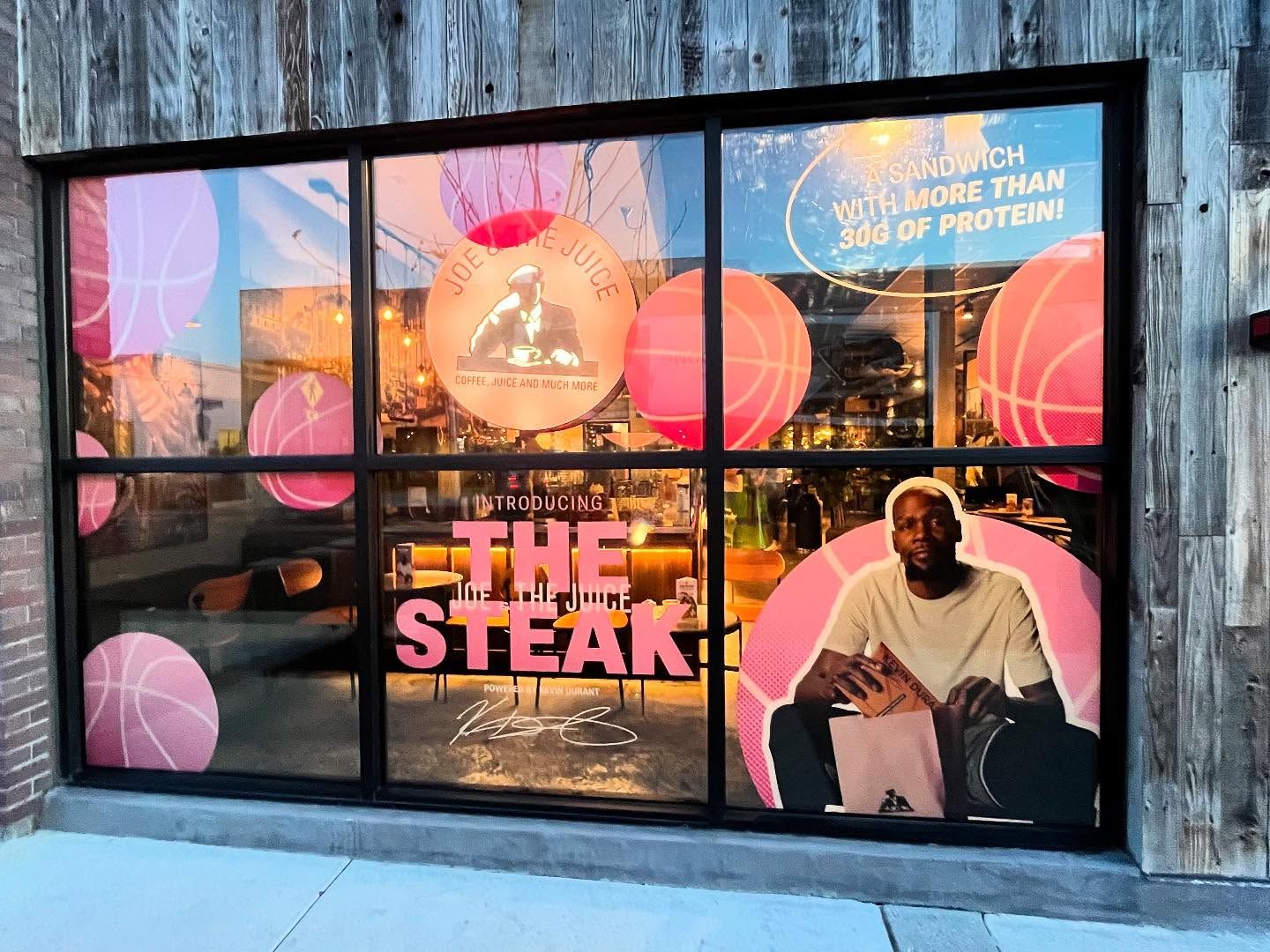 A window display for a restaurant called The Steak