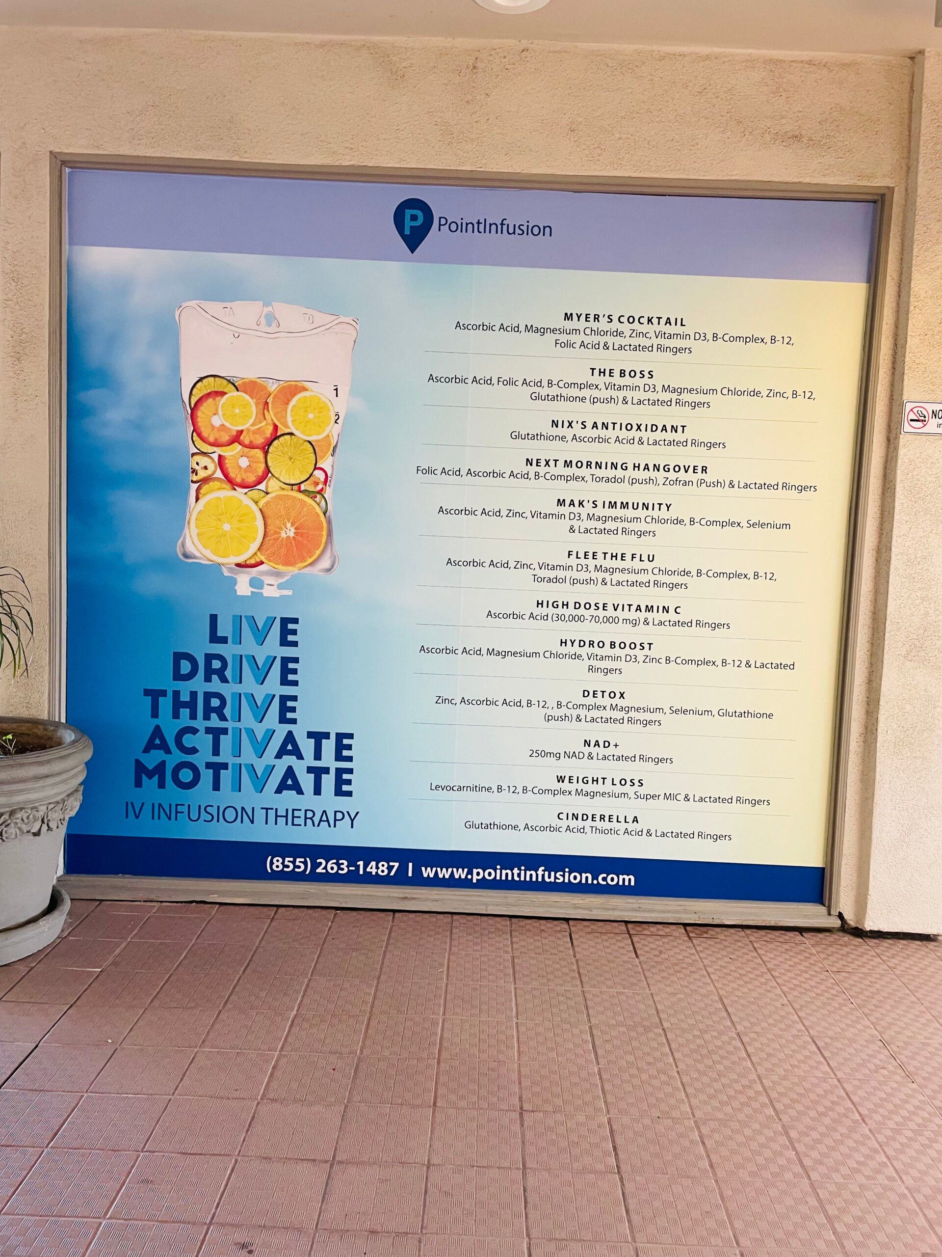A sign on a wall that says live drive thrive activate motivate