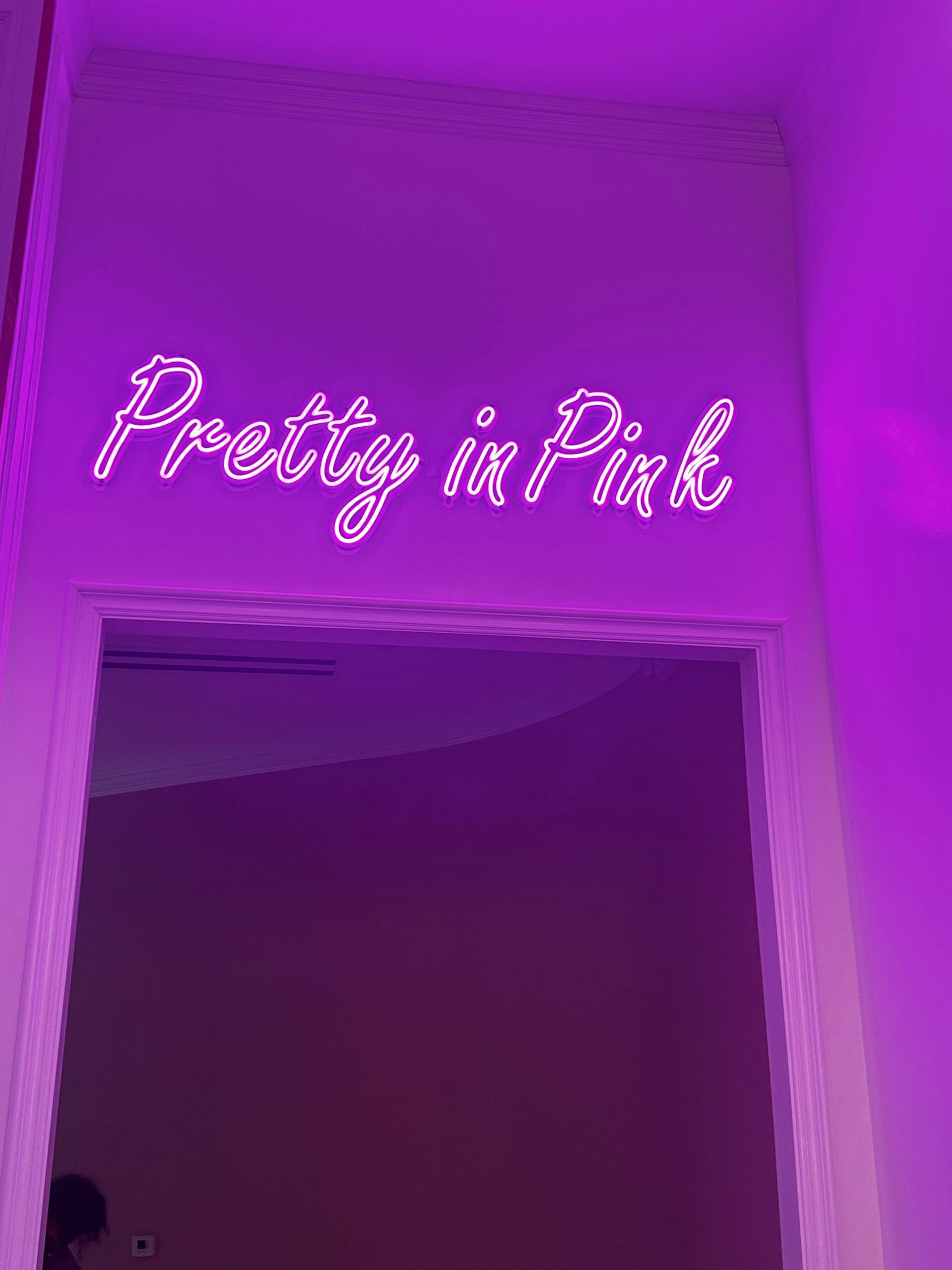 A neon sign that says