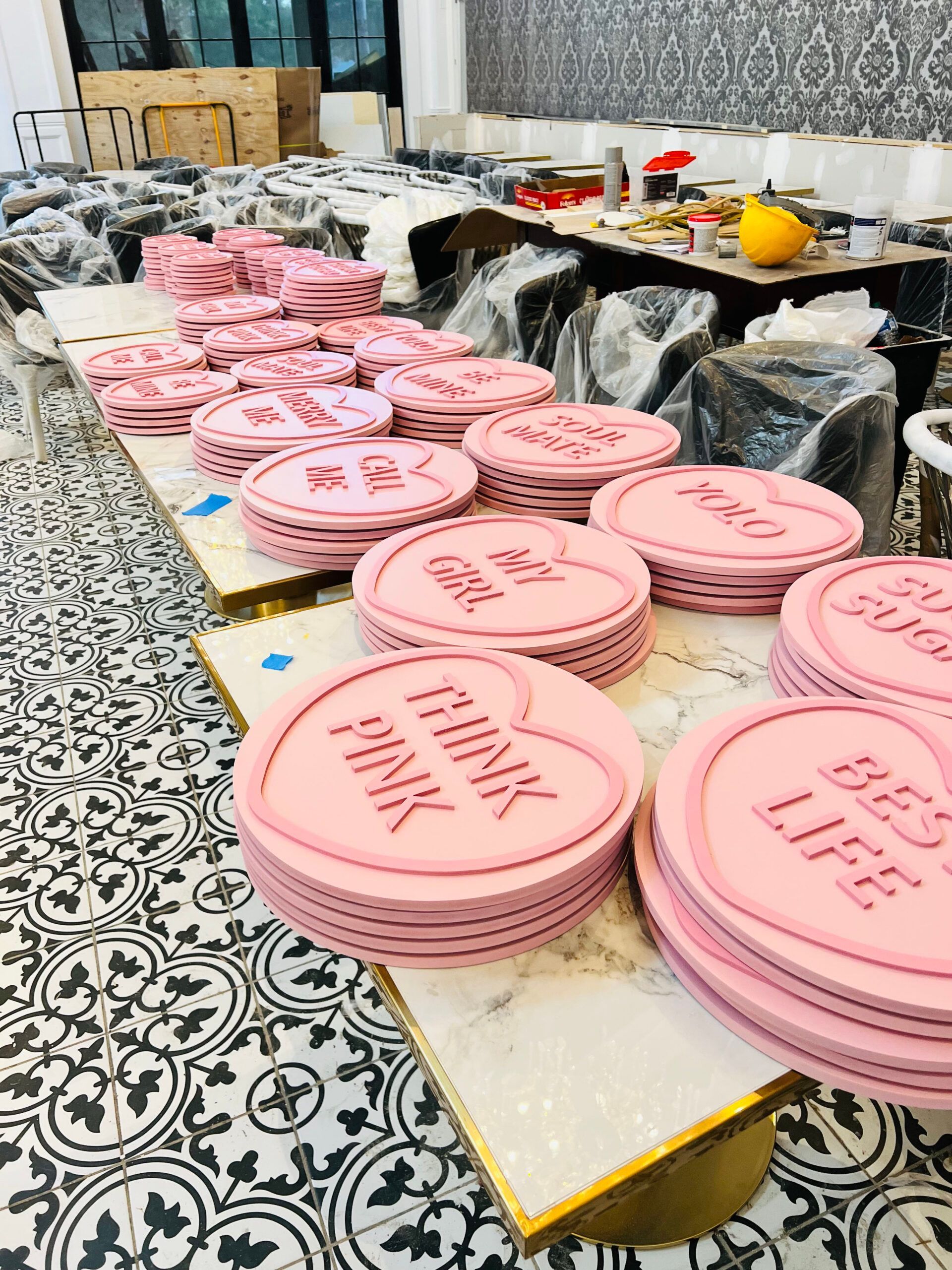 A bunch of pink plates with the words think pink on them