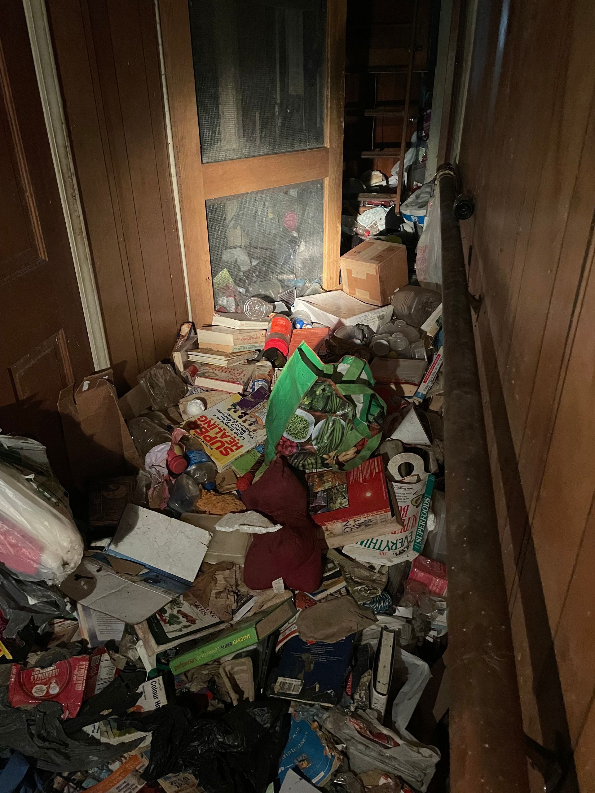 A room filled with lots of trash and junk.