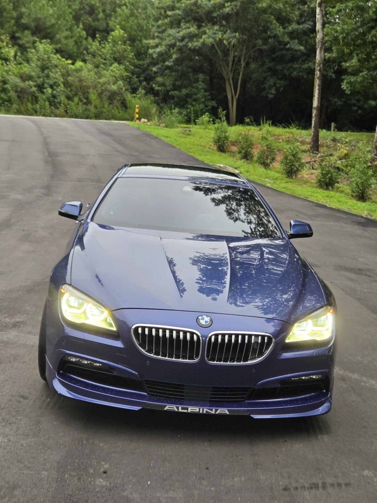 Front view of a blue car.