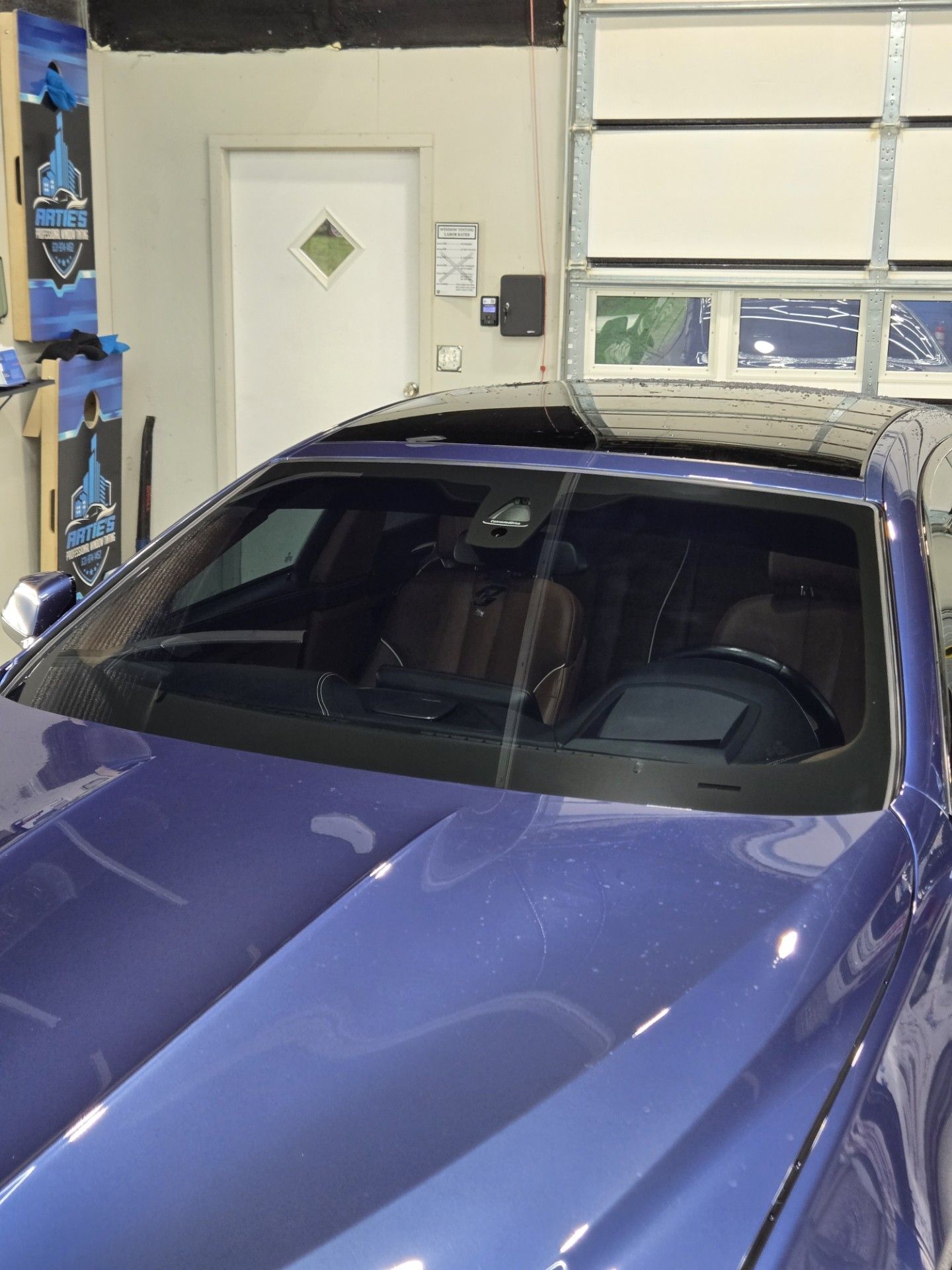 Top view of a midnight blue car.