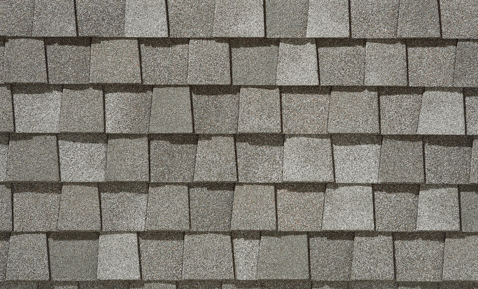 A close up of a roof with shingles on it.