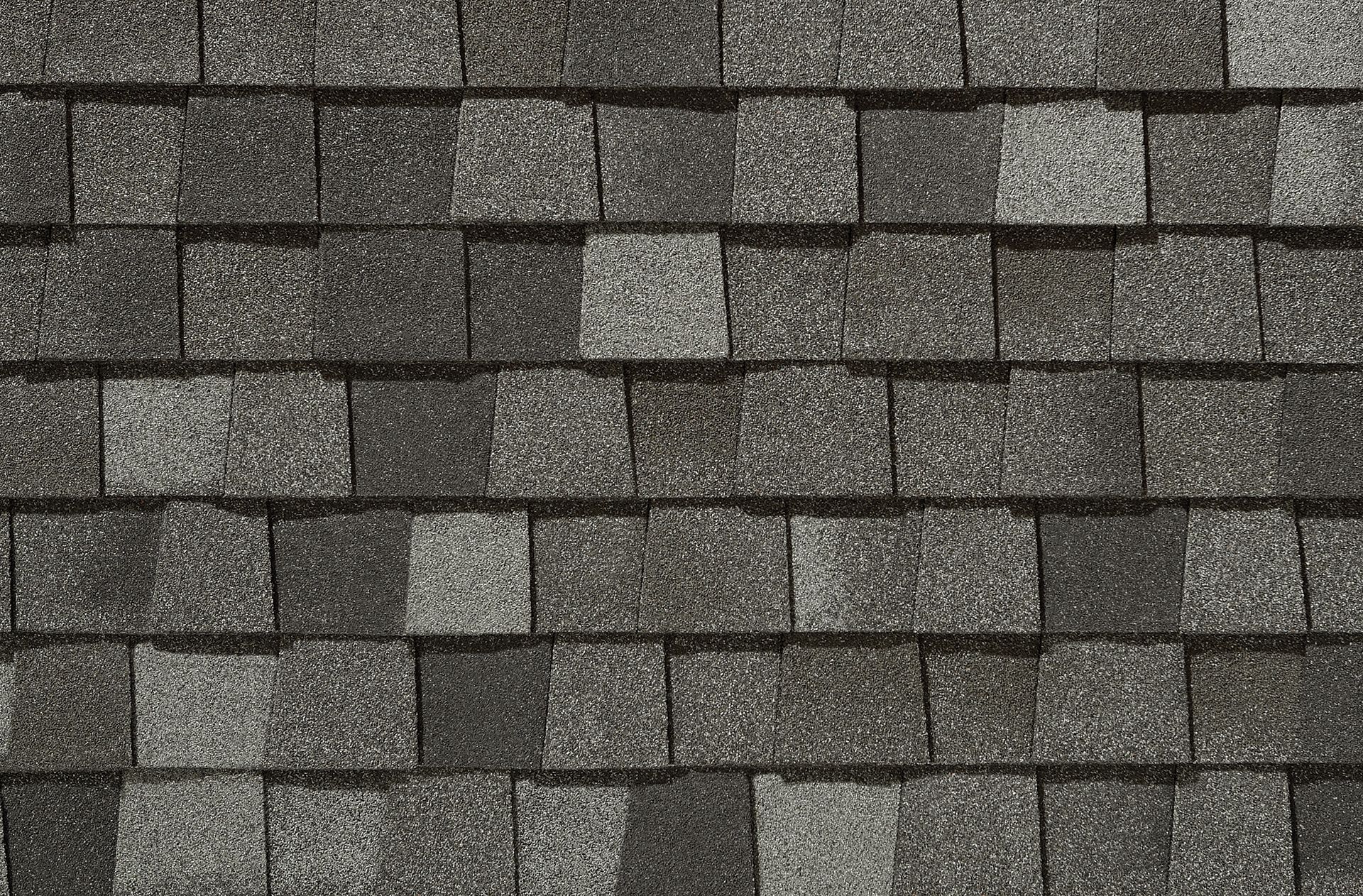 A close up of a roof with shingles on it.