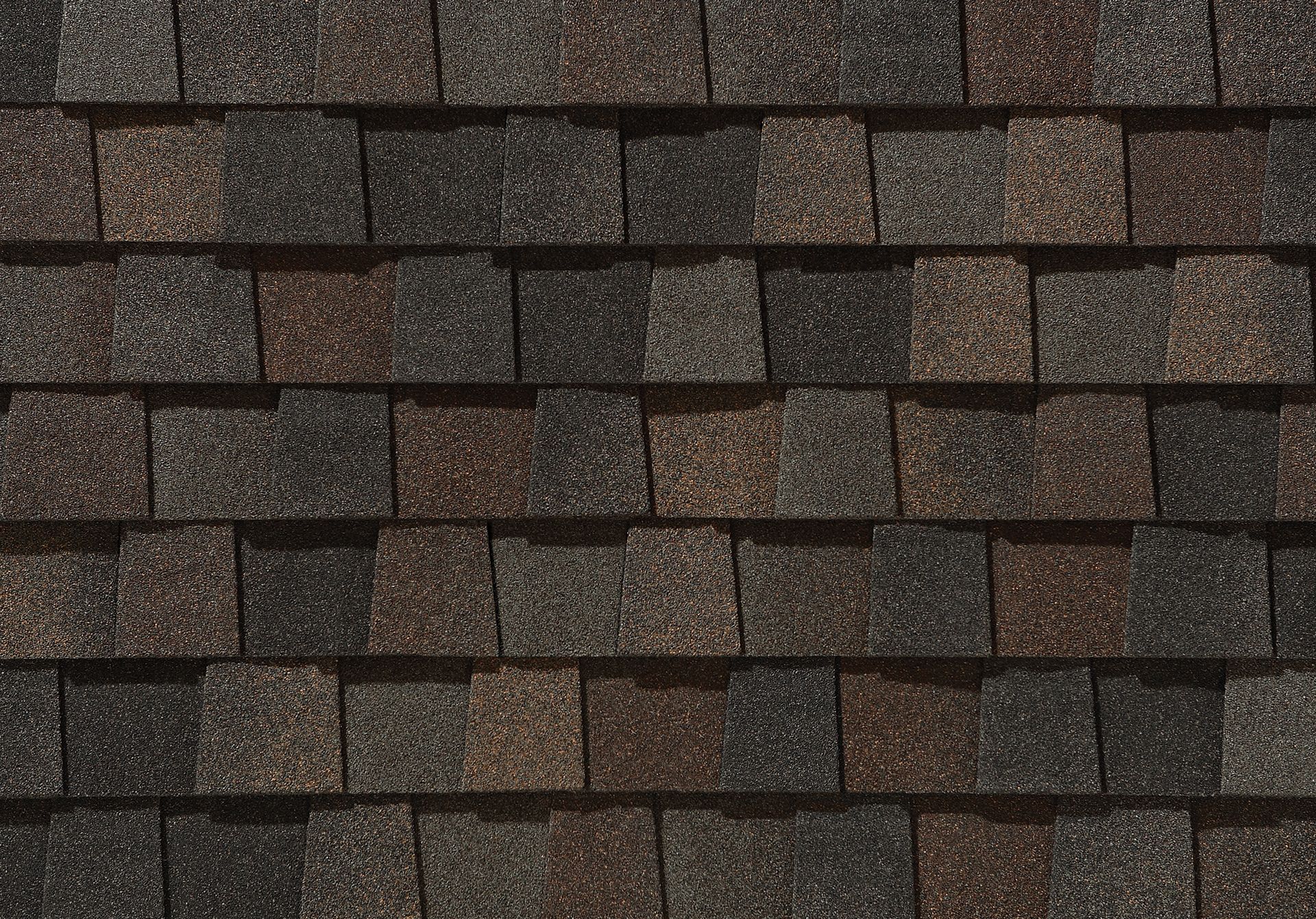 A close up of a roof with shingles on it