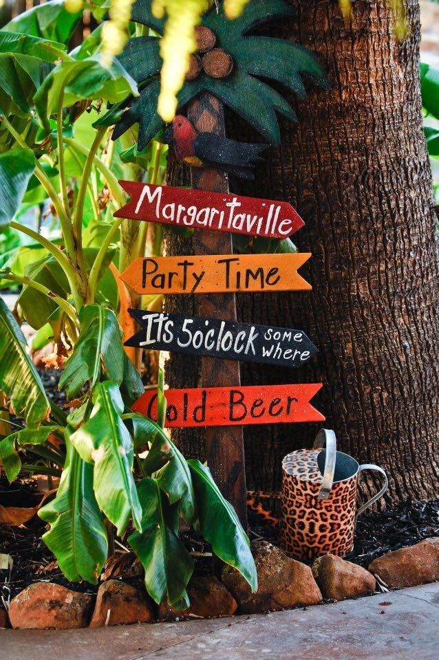A sign that says margaritaville party time and cold beer