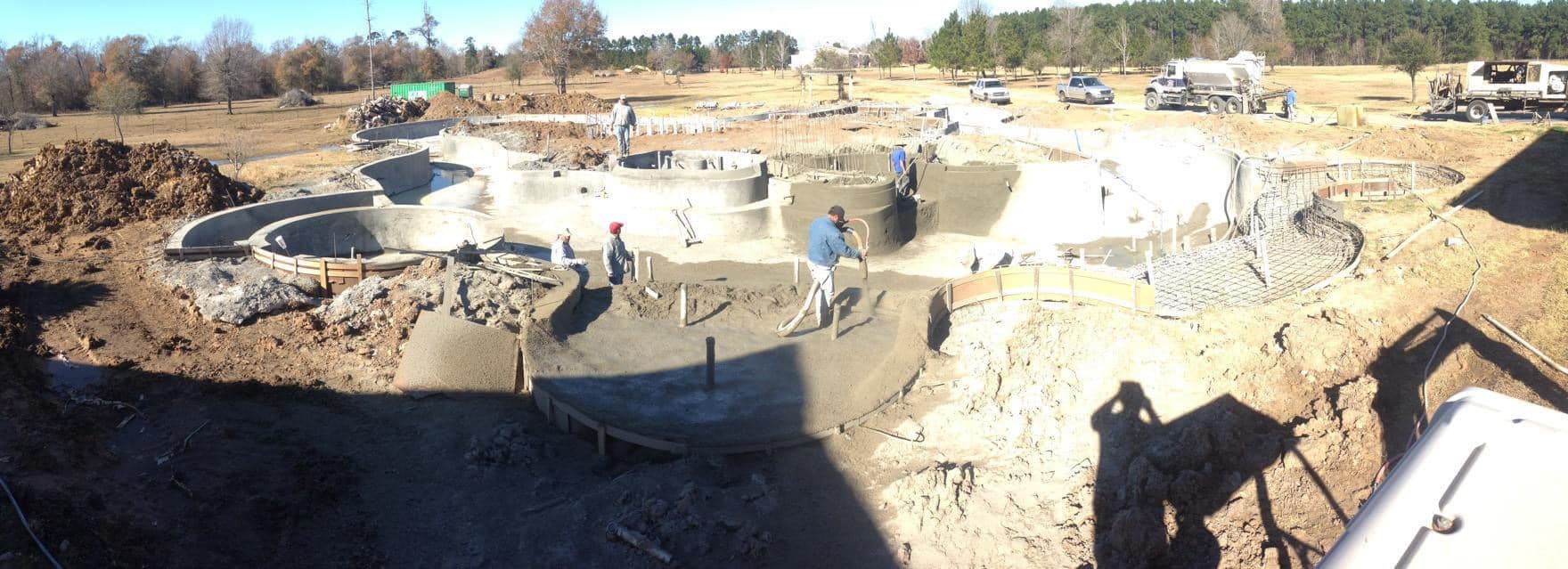A group of people are working on a construction site.
