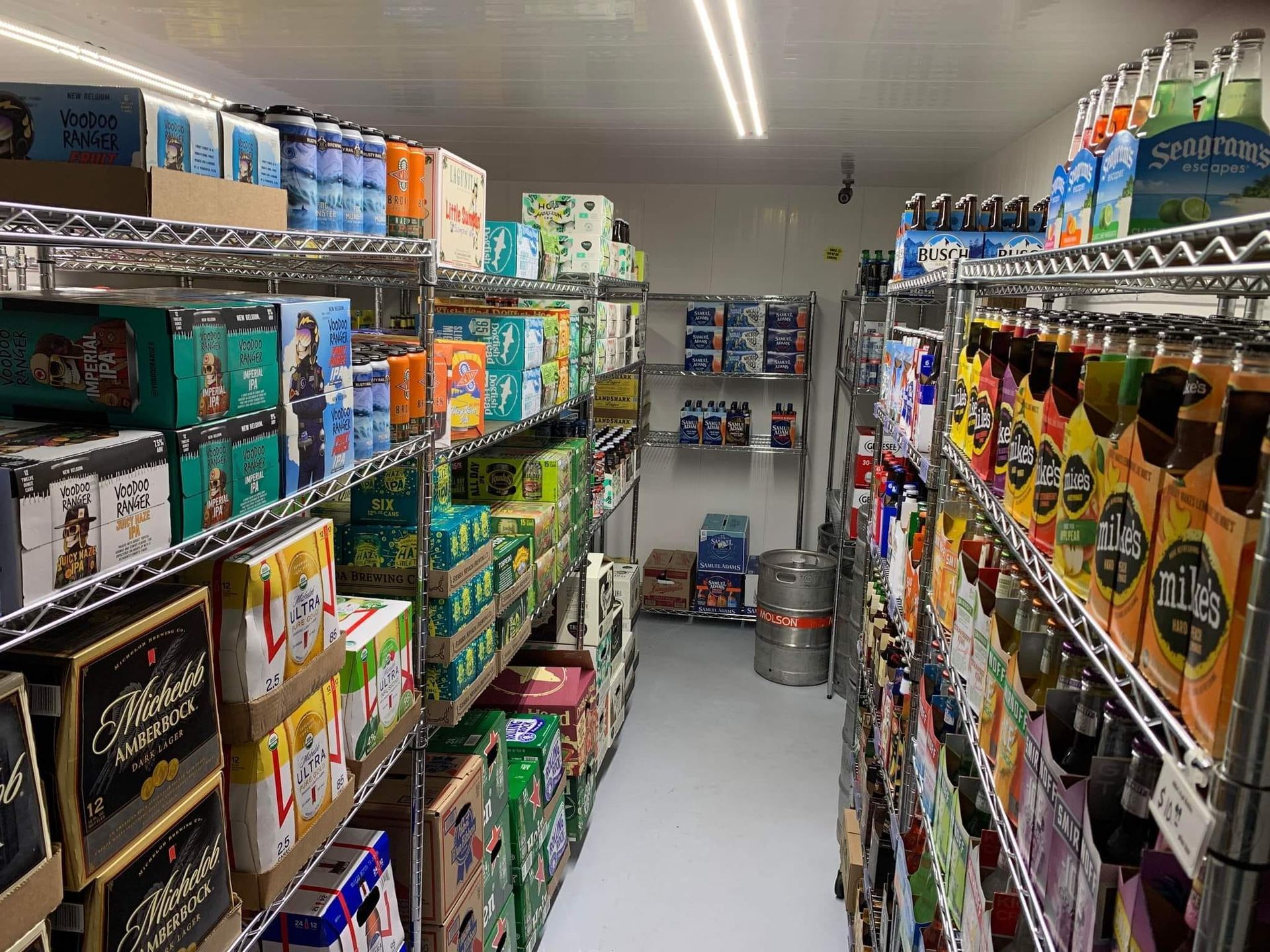 A liquor store filled with lots of beer and soda.