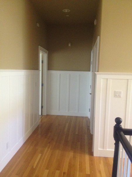 A hallway with hardwood floors 