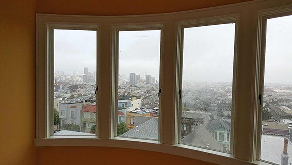 A room with three windows 