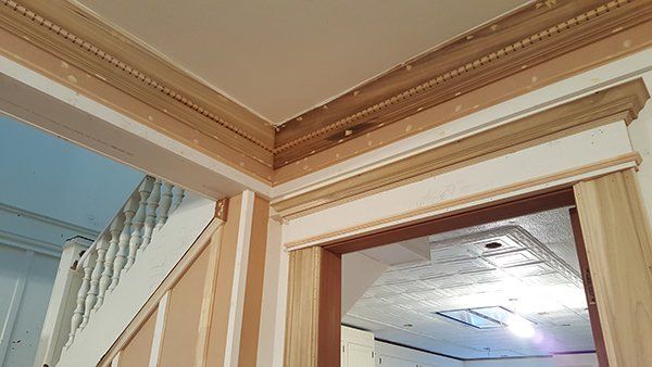 A doorway leading to a staircase in a house