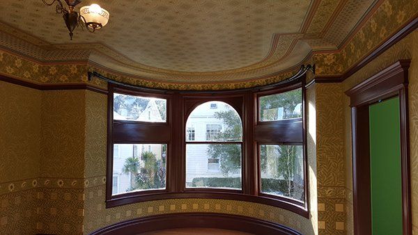 A room with a large bay window 