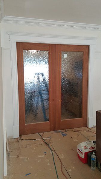 A sliding glass doors in a room 