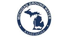 Logo for the Michigan Ground Water Association featuring a navy blue outline of Michigan inside a circular border.