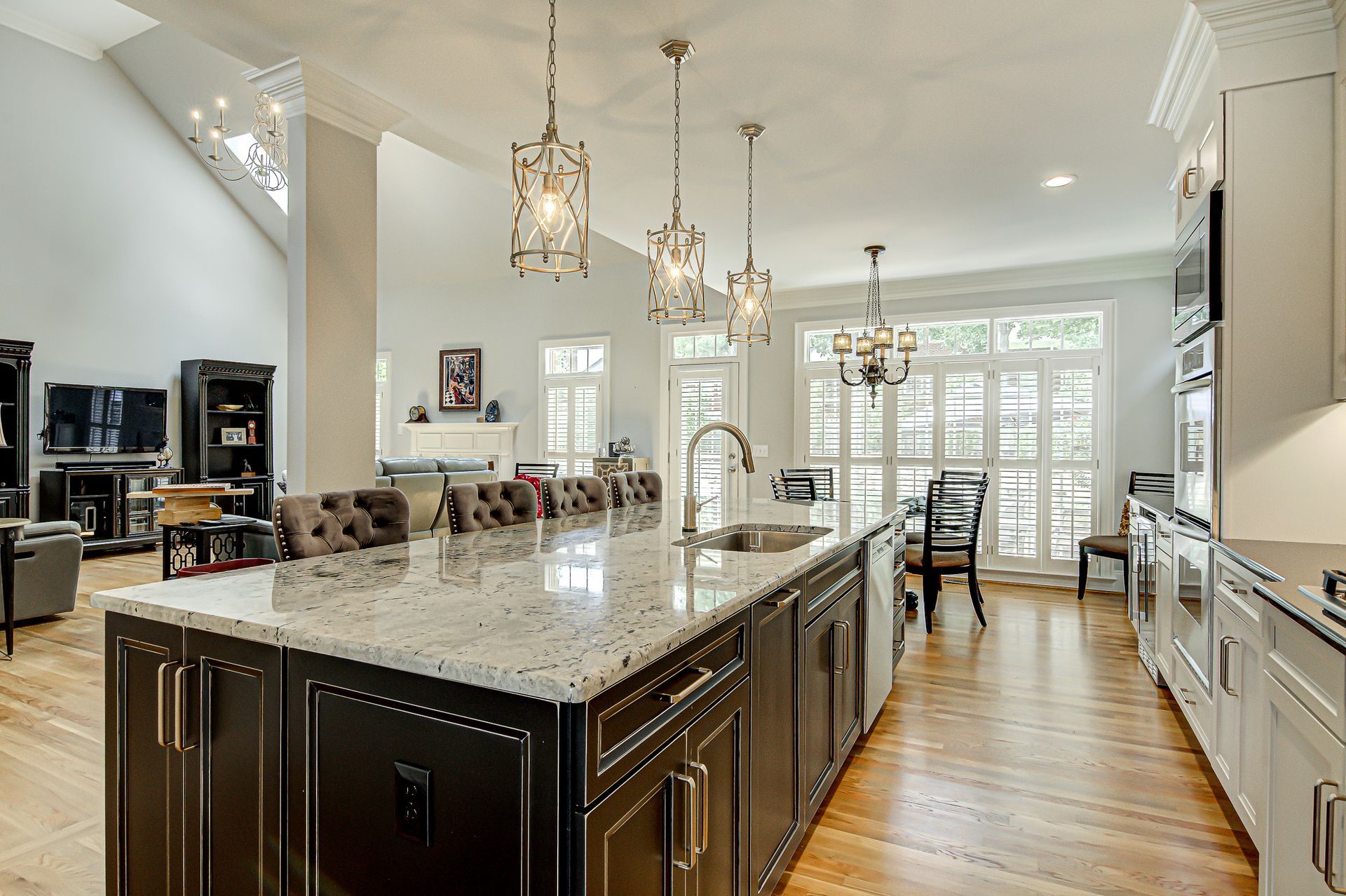 There is a large island in the middle of the kitchen.