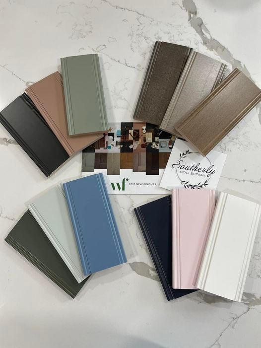 A bunch of tiles are sitting on top of each other on a table.