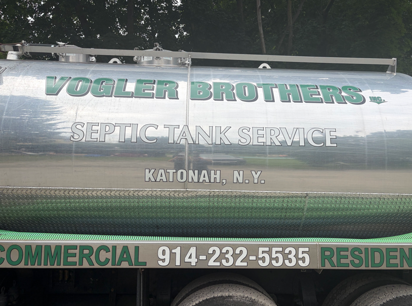 Vogler Brothers septic tank service sign on a truck, Katonah, N.Y.